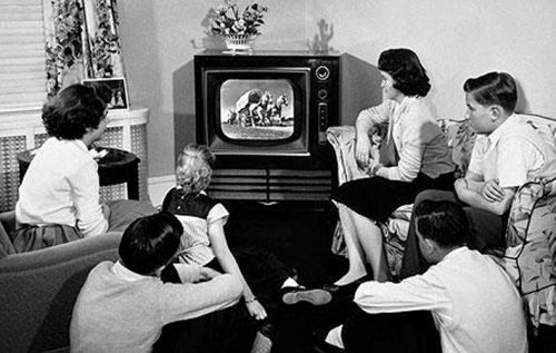 picture of people watching crappy old TV